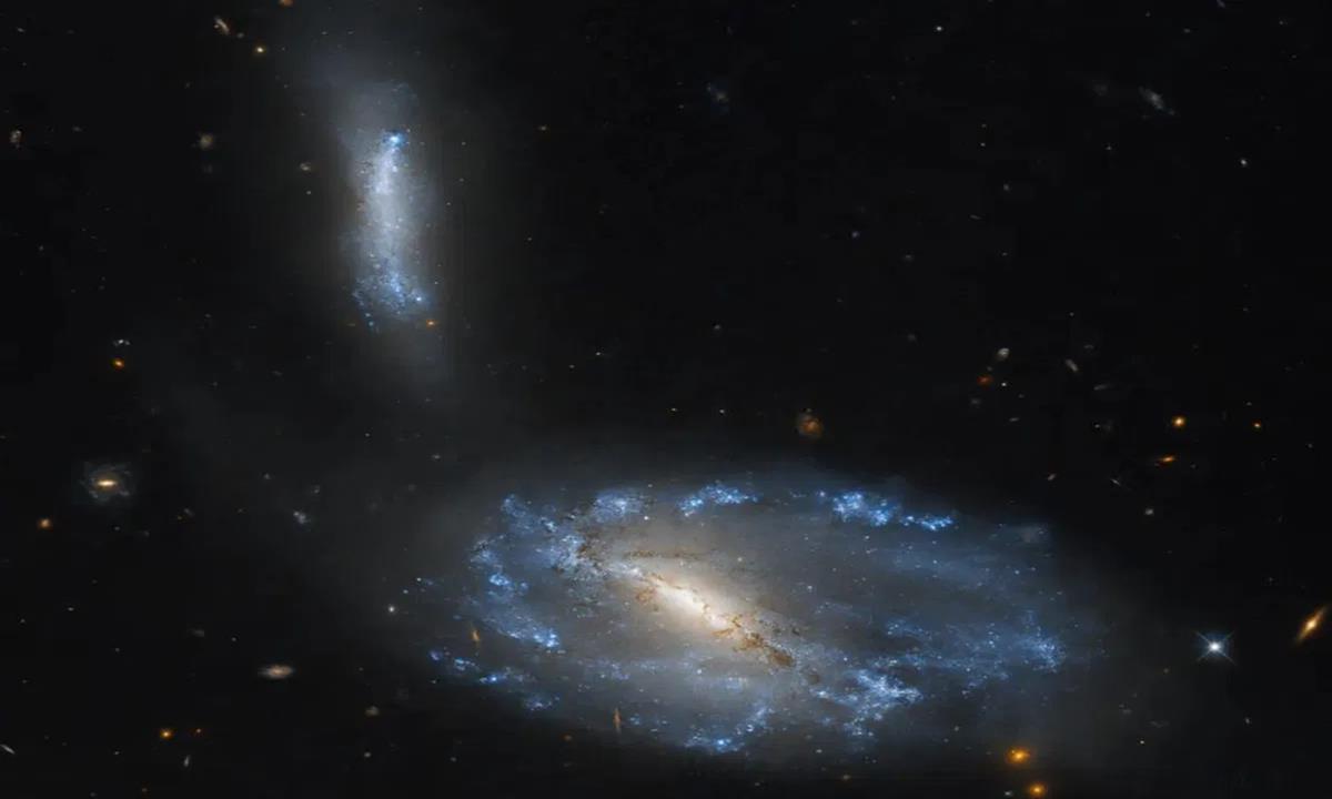 Hubble Space Telescope Captures Pairs Of Interacting Galaxies
